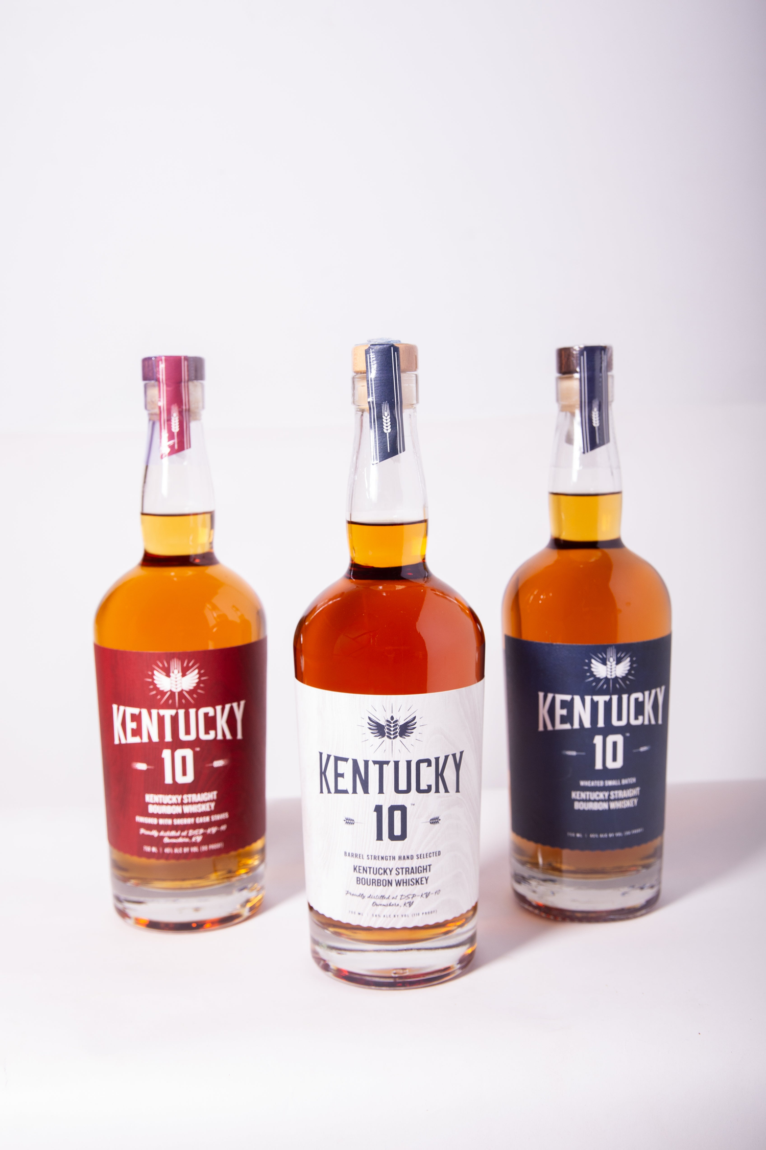 three bottles of Kentucky 10 bourbon