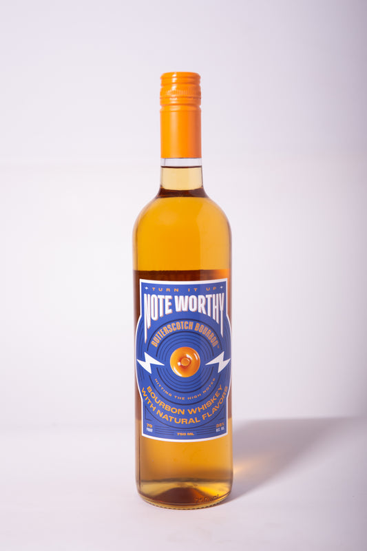 a bottle of butterscotch bourbon with an orange cap